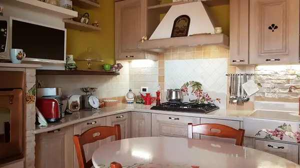cucina in finta muratura angolare realizzata su progettazione