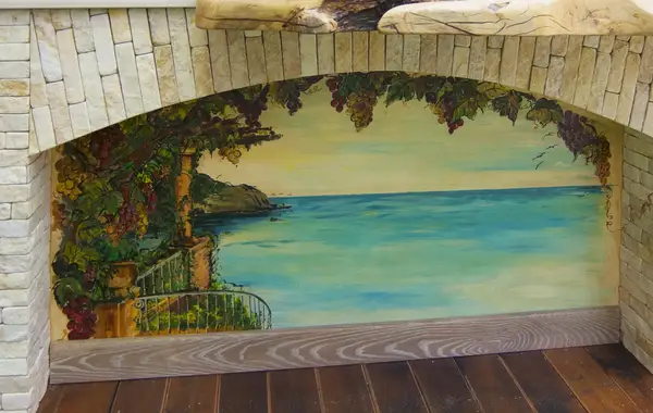 arco mattonicini rustici con pannello decorato