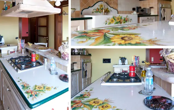 Cucina New Style: tre viste del piano cottura a quattro fuochi e del top decorato dell’isola