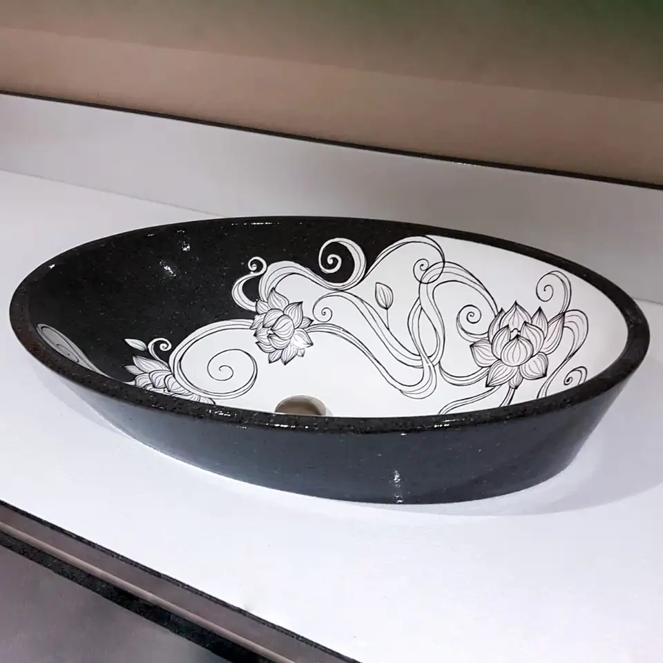Lavello bagno in pietra lavica con decoro moderno, codice LAV018. Soluzione su misura con decorazione artigianale.