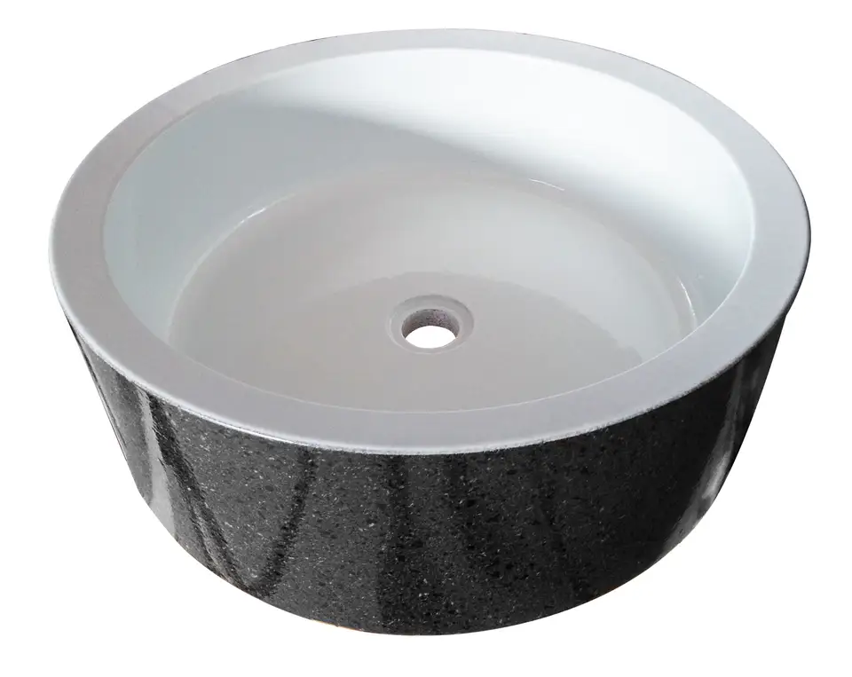 Lavello da appoggio rotondo in pietra lavica, codice LAV020. Realizzato su misura per un bagno elegante e artigianale.