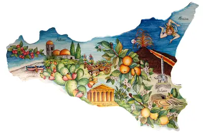 Sicilia in pietra lavica sagomata e decorata a mano