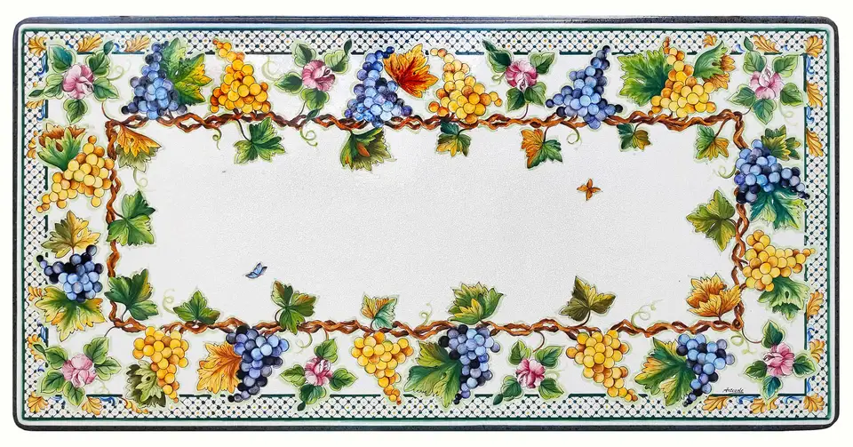 tavolo in pietra lavica con decoro uva