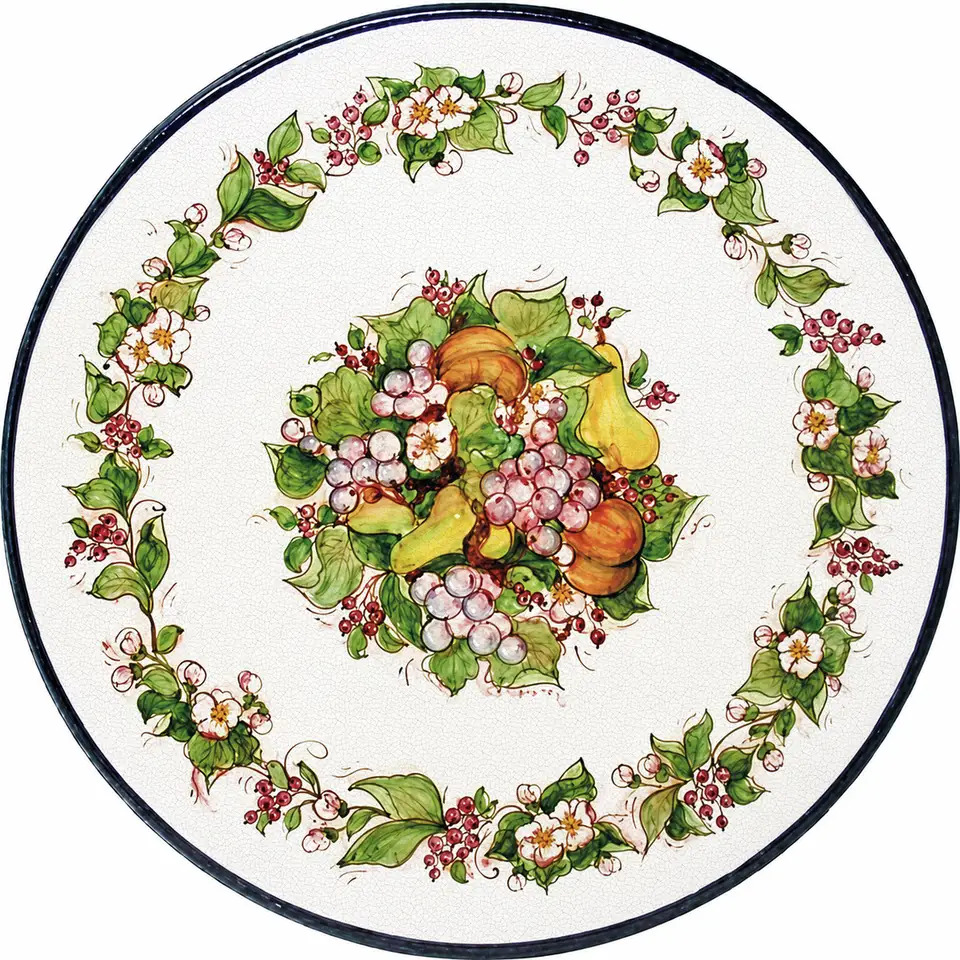 tavolo in pietra lavica rotondo con decoro di fiori e frutta