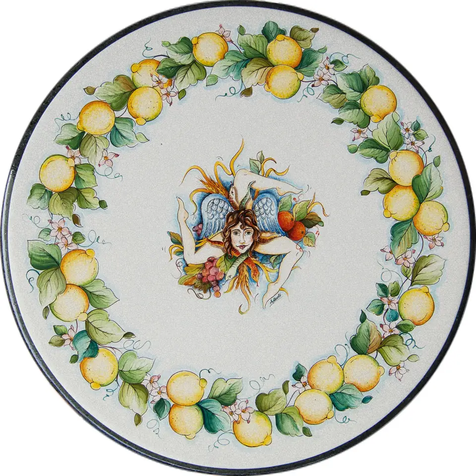 tavolo in pietra lavica con decoro limoni e trinacria centrale