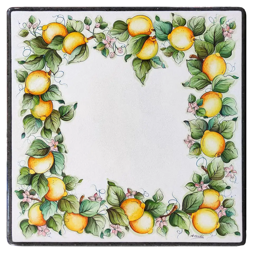 Tavolo in pietra lavica con decoro limoni di Caltagirone