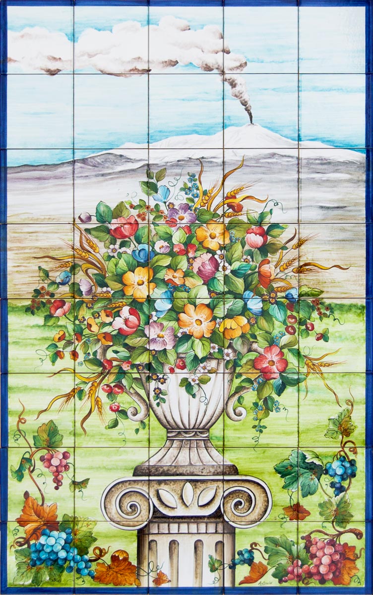 composizione di mattonelle decorate a mano con decoro Etna e fiori