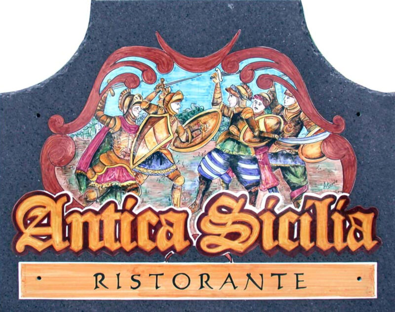 insegna ristorante Antica Sicilia in pietra lavica decorata a mano, realizzata su misura